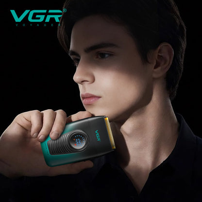 Man holding the VGR V-396 compact titanium foil shaver against jawline for a close, smooth facial shave