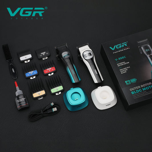 Overhead view of the VGR V-888C hair clipper set in both teal and white, displaying 6 colored guide combs, charging docks, lubricating oil, cleaning brush, USB cable, and retail box.