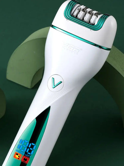 Close-up angle of the VGR V-728 cordless epilator highlighting the V-shaped power button, white ergonomic body, and illuminated LED digital battery percentage display