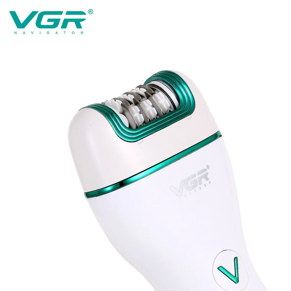 Detailed macro shot of the VGR V-728 18-tweezer head with emerald green accents for precision hair removal