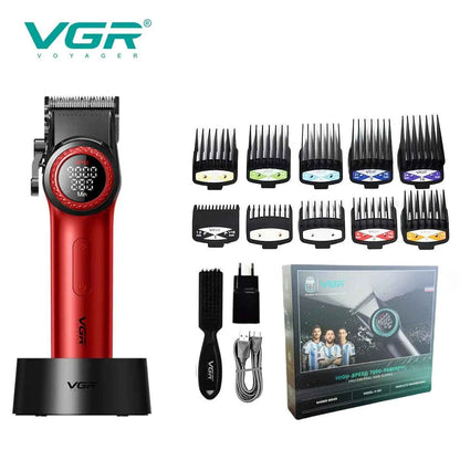 Red VGR Voyager V-001 professional hair clipper on a black charging dock, displayed with 10 guide combs, cleaning brush, USB cable, EU wall adapter, and retail packaging box.