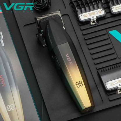 VGR V-003 cordless hair clipper in black and gold finish with LED battery display and guide combs