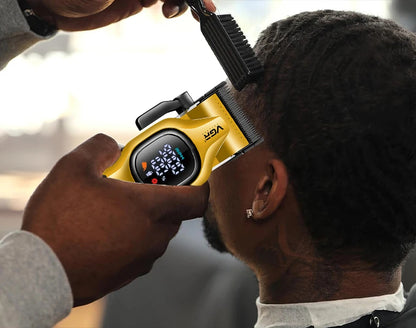 A barber's hand holding the VGR V-886C gold hair clipper to trim a client's hair, showcasing real-world professional use
