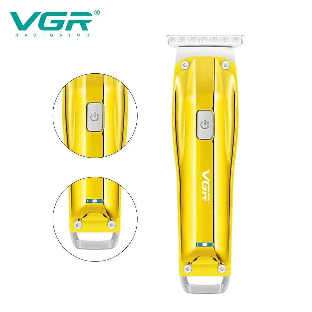 full front view of the golden vgr v955 electric hair clipper featuring detailed zoom circles on the metallic power button and the charging indicator light.
