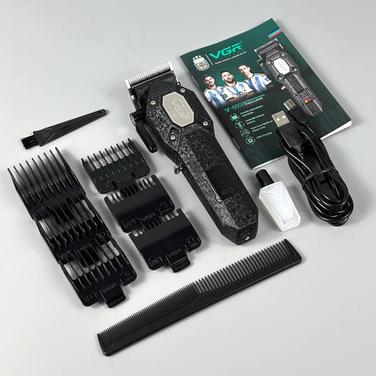 VGR V-600B textured black professional hair clipper set displayed with 6 guide combs, barber comb, oil bottle, cleaning brush, USB cable, and user manual