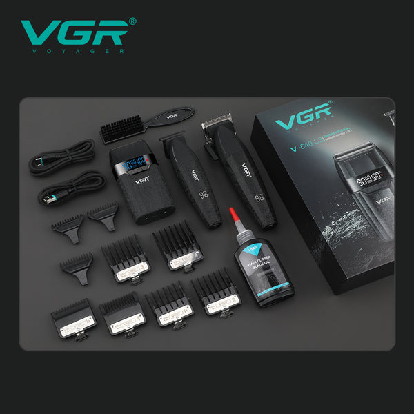 Complete VGR V-640 S3 professional 3-in-1 barber kit laying flat with box, clipper, trimmer, shaver, 9 guide combs, cables, and blade oil.